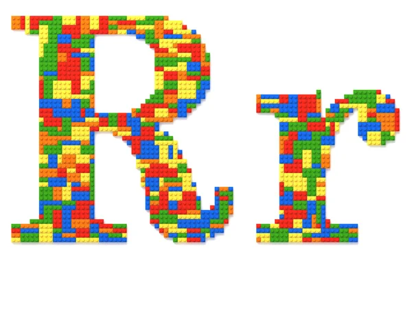 Písmeno r, postavené z cihel hračku v náhodném barvách — Stock fotografie
