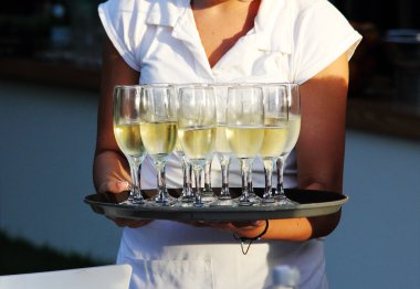 Waiter serving champagne clipart