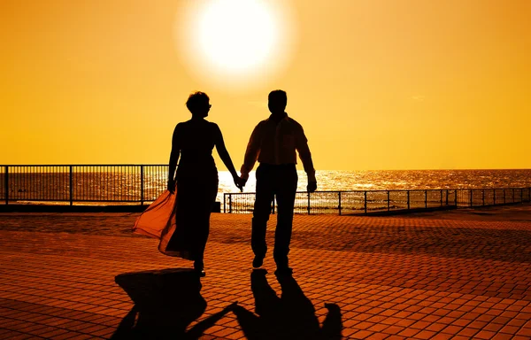 Two on the beach at sunset — Stock Photo, Image