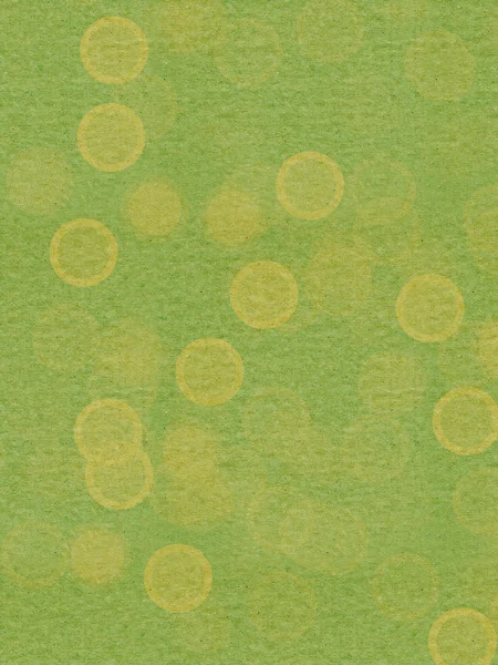 Green textured paper with random large dots — Stock Photo, Image