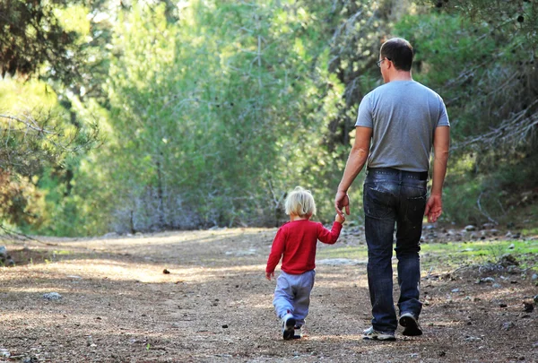 Father and daughter in the spring forest — Stock Photo, Image