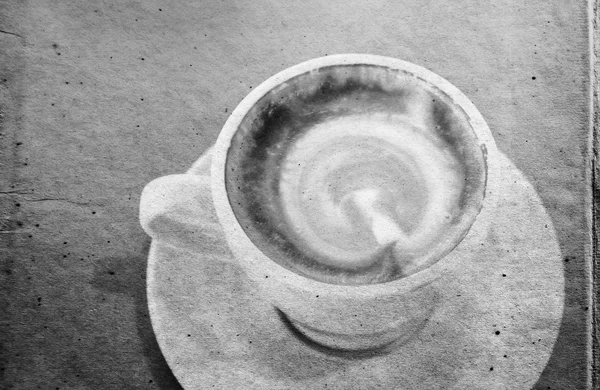 Taza de café en el patrón de papel texturizado —  Fotos de Stock