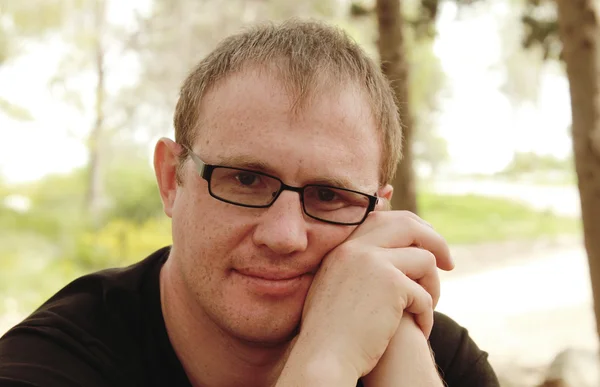 Handsome 35 years old man with glasses outdoors — Stock Photo, Image