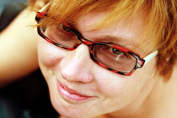 Close up portrait of attractive redheaded woman. Focus on the ey — Stock Photo, Image