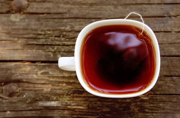 Tazza di tè su bachground di legno — Foto Stock