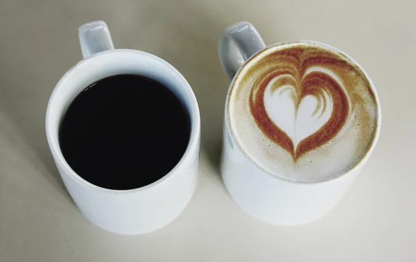 Due tazze di caffè per uomo e per donna — Foto Stock