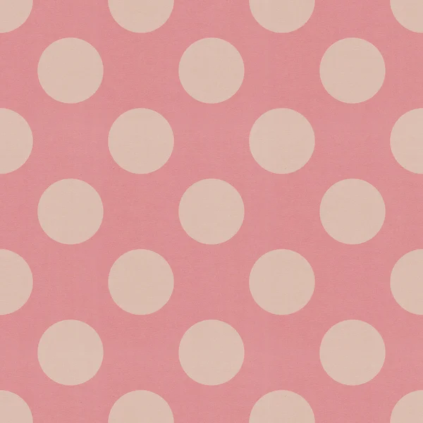 Seamless pink polka dots patten on textured paper — Stock Photo, Image