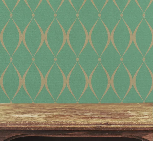 Background with wooden deck table on vintage wallpaper — Stock Photo, Image