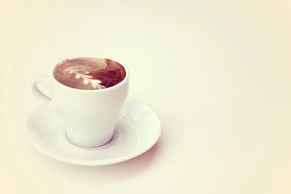 Tasse Kaffee auf Pastellfarben — Stockfoto