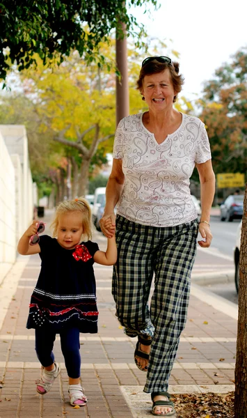 Happy Grandma With Granddaughter