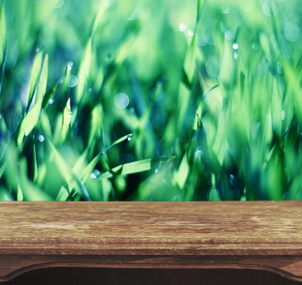 Tavolo vintage in legno con sfondo — Foto Stock