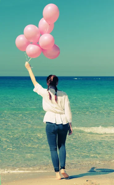 Woman with balloons — Stock Photo, Image