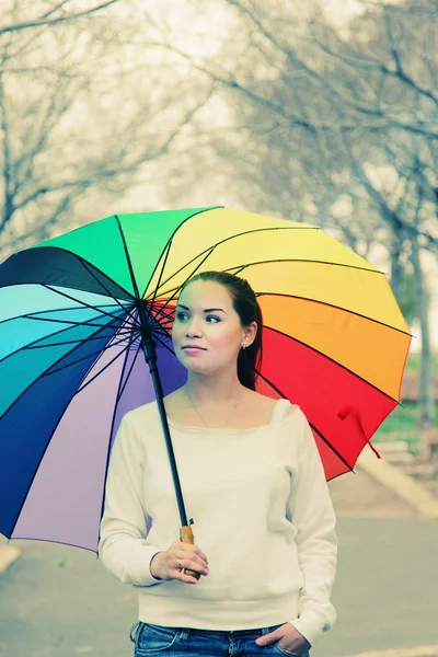 Woman with colorful umbrella — Stock Photo, Image