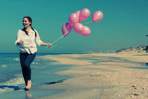 Vrouw met ballonnen — Stockfoto