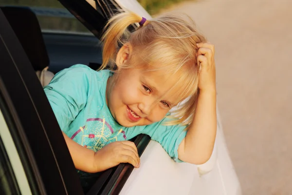Portrait of little girl in the car — Stock Photo, Image