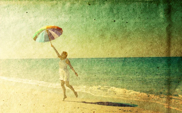 우산을 가진 여자입니다. 오래 된 컬러 이미지 스타일 사진. — Stockfoto