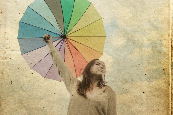 Woman with umbrella. Photo in old color image style. — Stock Photo, Image