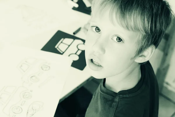 6 years old boy drawing — Stock Photo, Image