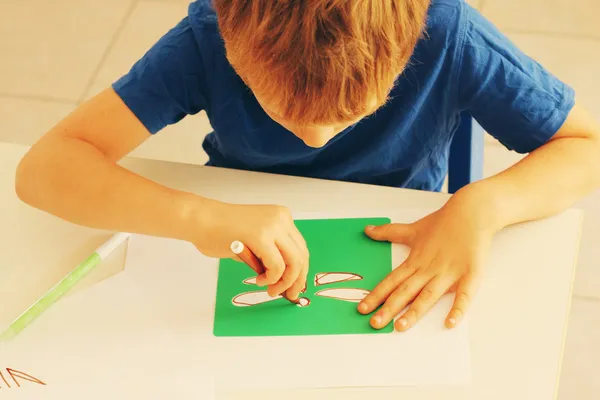 6 years old boy drawing — Stock Photo, Image