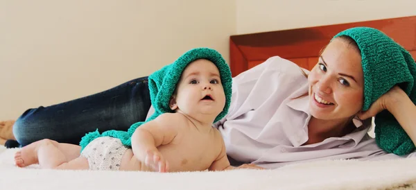 Young mother with her 6 month old baby — Stock Photo, Image