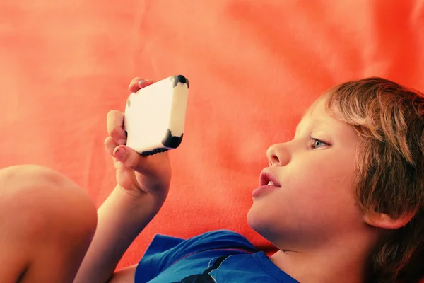 Cute boy with mobile phone — Stock Photo, Image