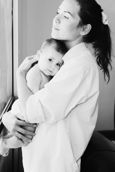 Young mother with her 6 month old baby — Stock Photo, Image