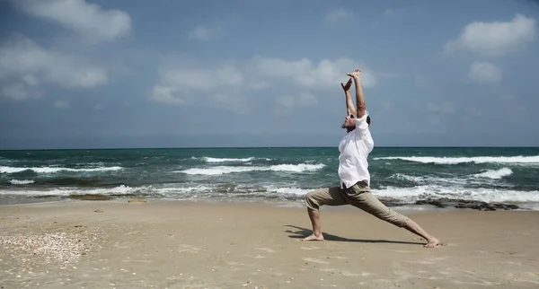 Yoga Lesson Man Practices Yoga Sea — Photo