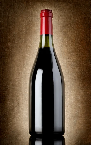 Bottle of wine on the old background — Stock Photo, Image