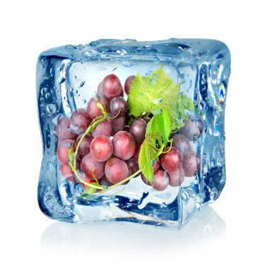 Ice cube and blue grapes clipart