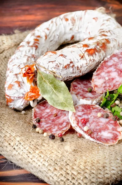 Salami sausage and spices — Stock Photo, Image