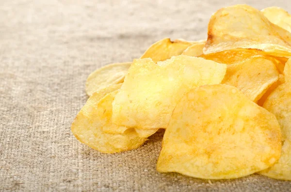 Potato chips on a canvas — Stock Photo, Image