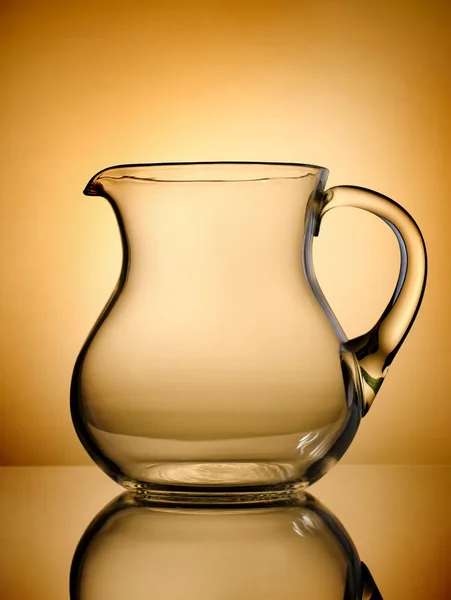 Pitcher on a gold background — Stock Photo, Image