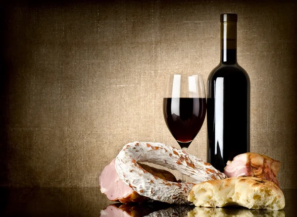 Wine and sausage, bread — Stock Photo, Image