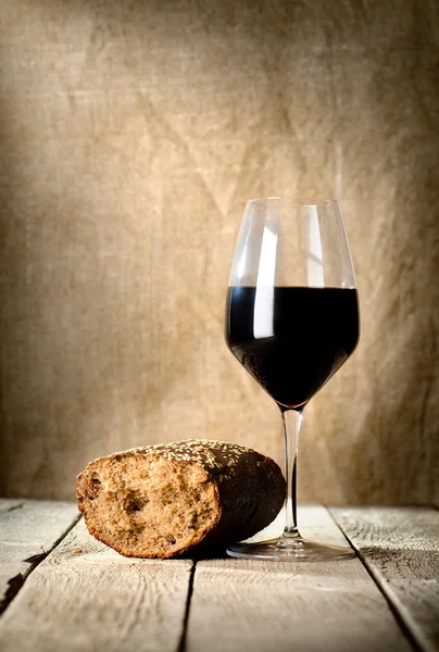 Wine glass and bread — Stock Photo, Image