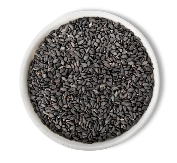 Black sesame in plate isolated — Stock Photo, Image