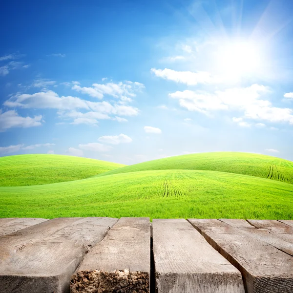 Table and field — Stock Photo, Image