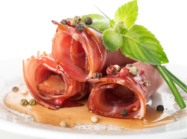 Bacon in sauce on white — Stock Photo, Image