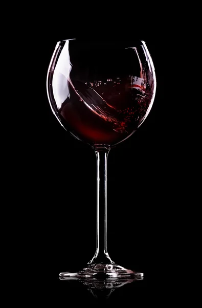 Våg av vin i vinglas — Stockfoto