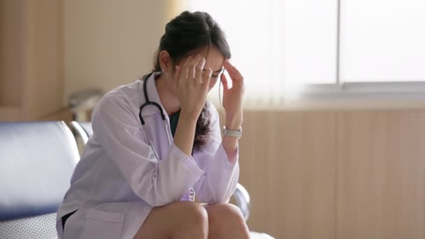 Female Doctor Worried Sitting Chair Hospital Office — Stock Video