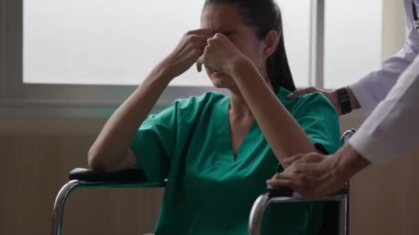 Exhausted Young Woman Wheelchair Hospital Closes Her Eyes Tears Doctor — Stock Video