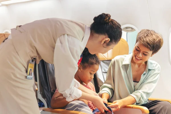 Child Safety Belt Being Fastened Air Hostess — Photo