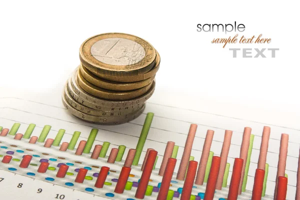 Charts and coins — Stock Photo, Image