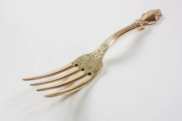 Golden fork — Stock Photo, Image