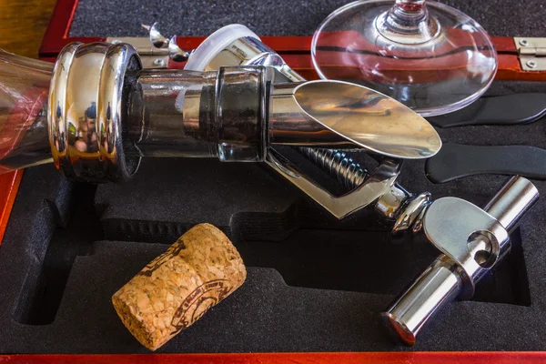The bottle with corkscrew and wine accessories — Stock Photo, Image
