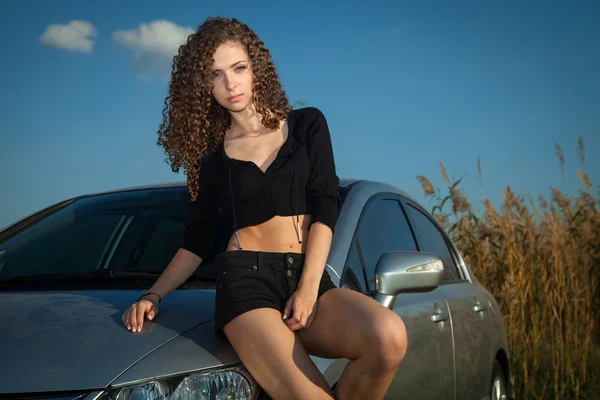 Pretty girl in a car — Stock Photo, Image