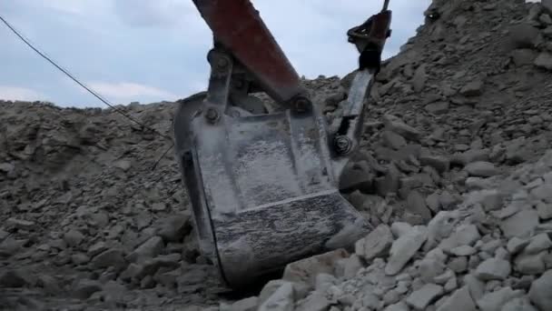 Heavy mining dump truck being loaded with iron ore — Stock Video