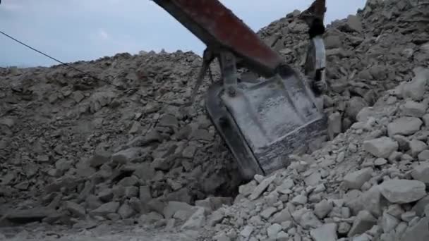 Heavy mining dump truck being loaded with iron ore — Stock Video