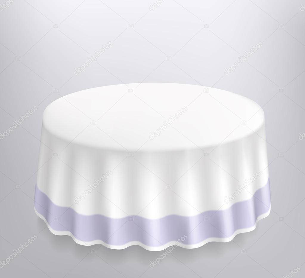 Round table with a white cloth.