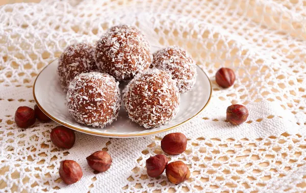 Homemade sweets with crumbs of cookies, coconut and nuts — Stock Photo, Image