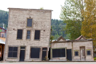 Goldrush heritage buildings in Dawson City Yukon clipart